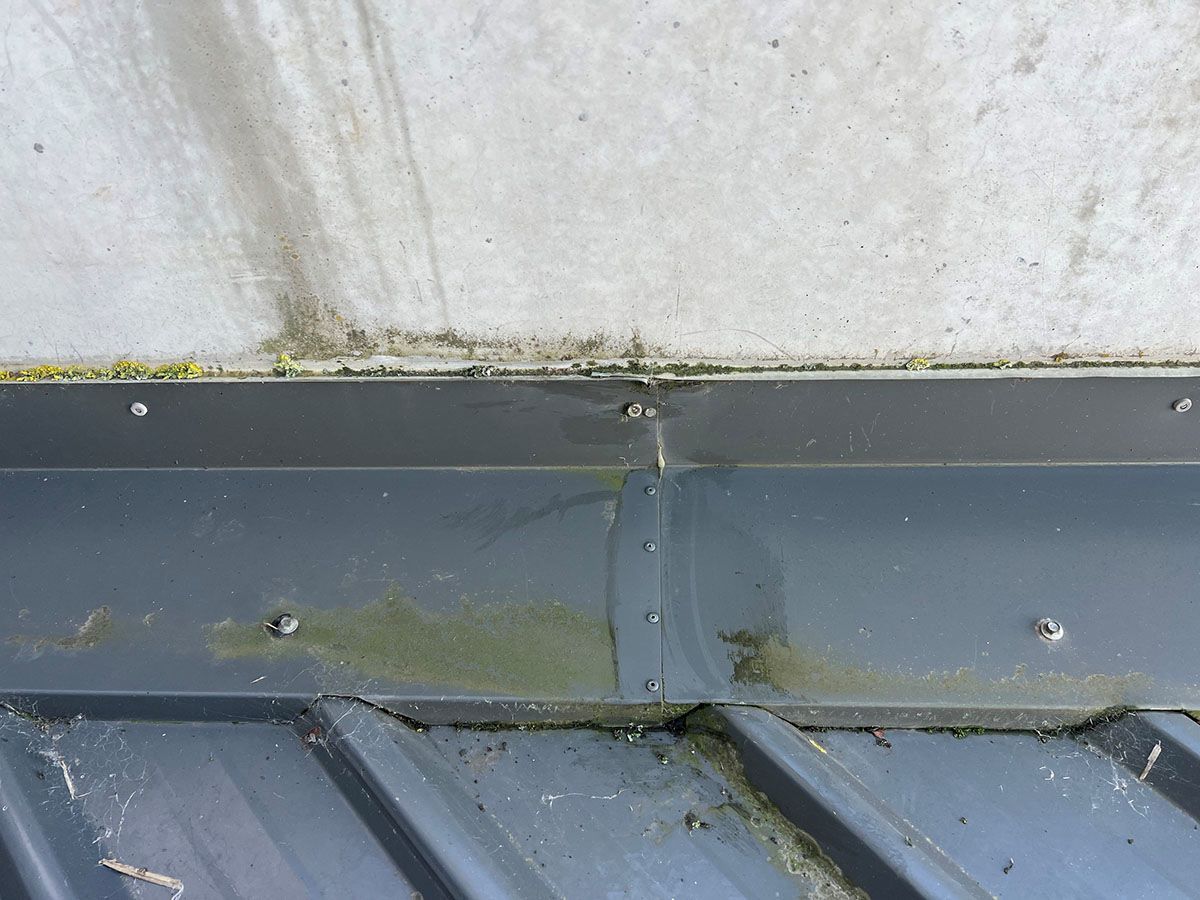 A Blue House With a Metal Roof is Being Built — Fig Facility Services in Lara, VIC