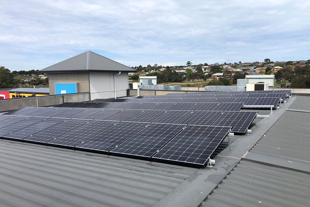 A Roof With a Lot of Solar Panels on It — Fig Facility Services in Lara, VIC