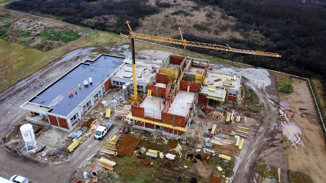Aerial view of construction site with crane