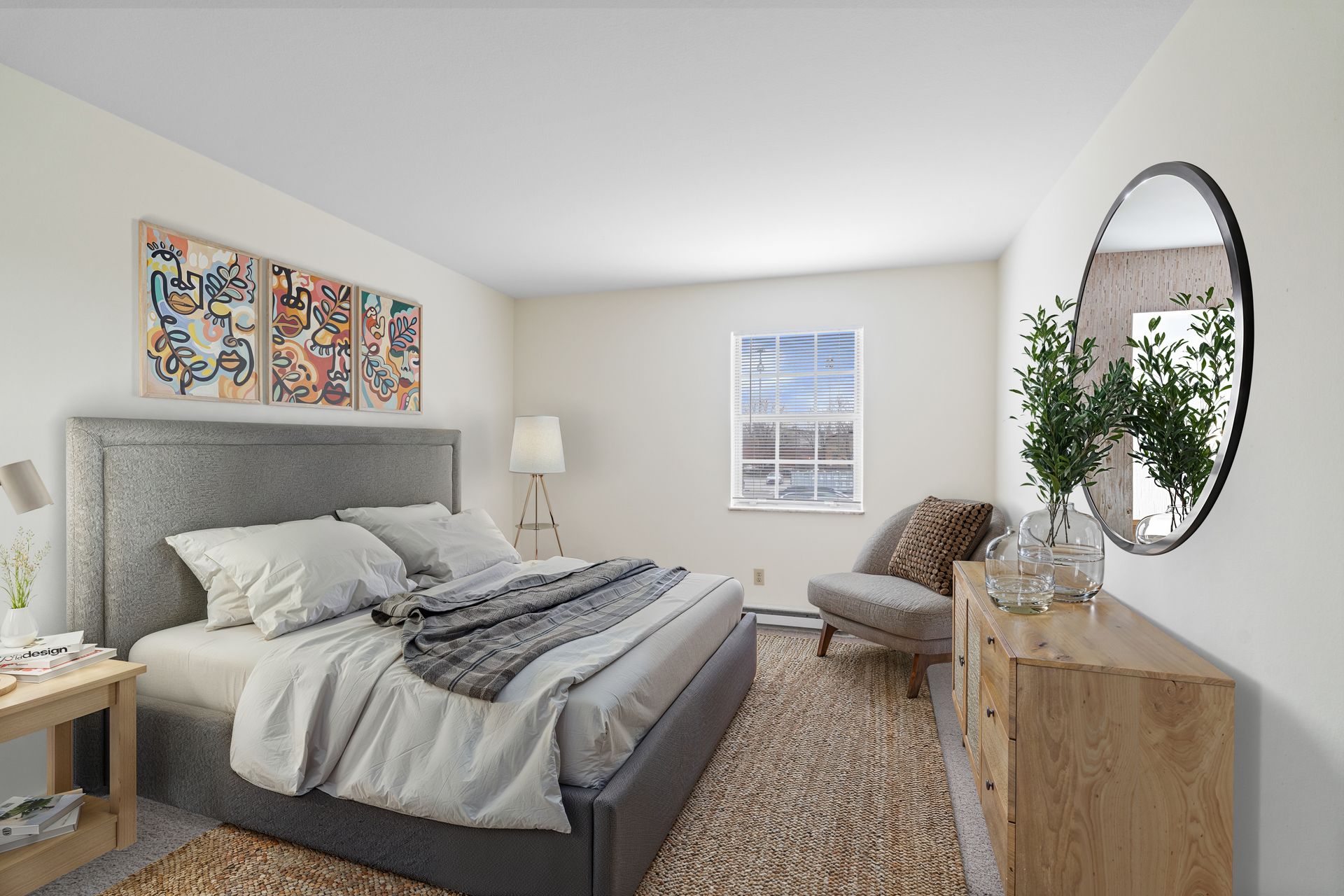 Photo of a bedroom with a tall window