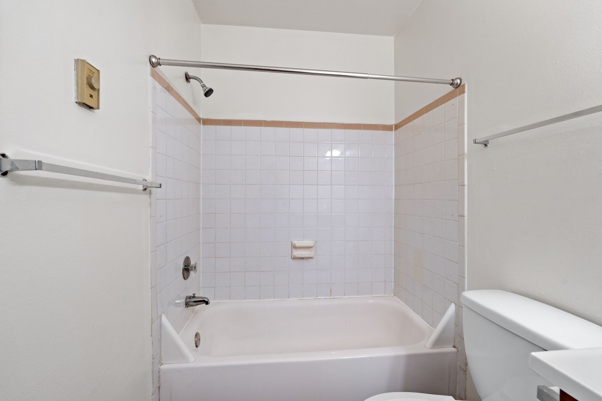 Photo of a bathtub/shower combo