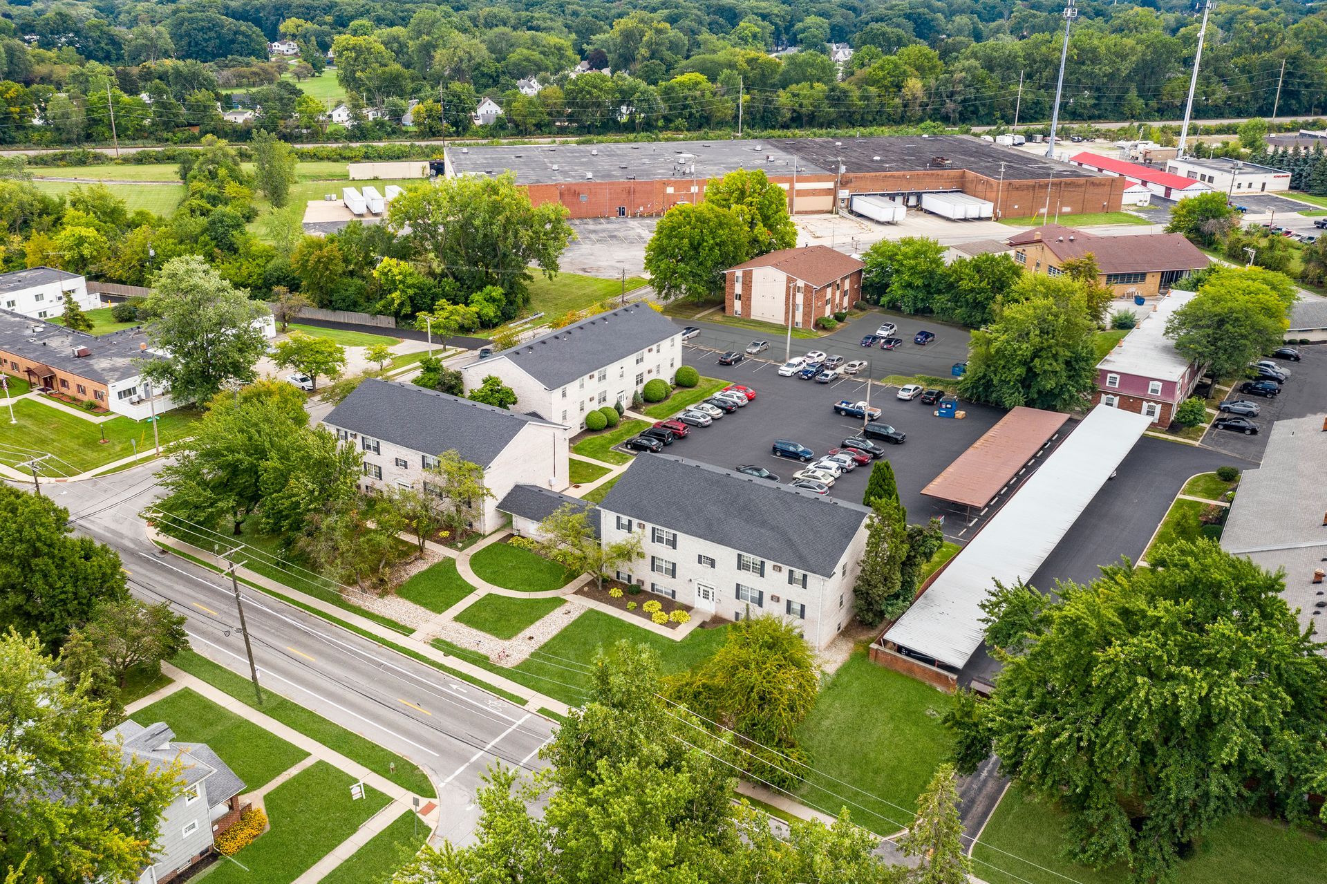 Photo of a community showing a central parking lot