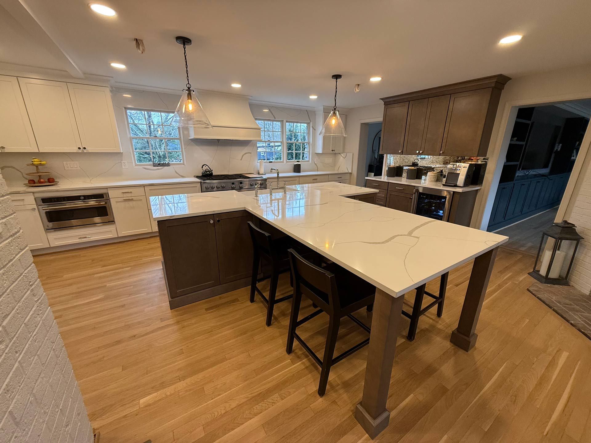 There is a large island in the middle of the kitchen.