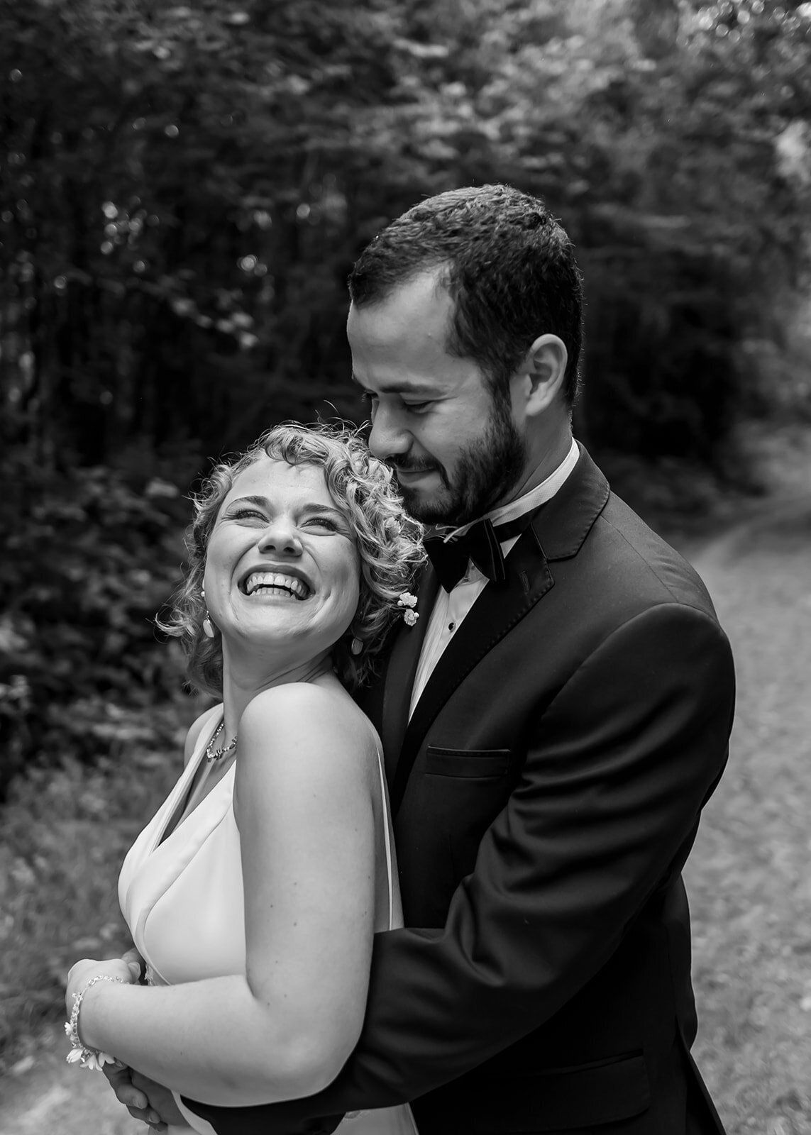 Black and White Bride and Groom Wedding Photography natural laugh.jpg