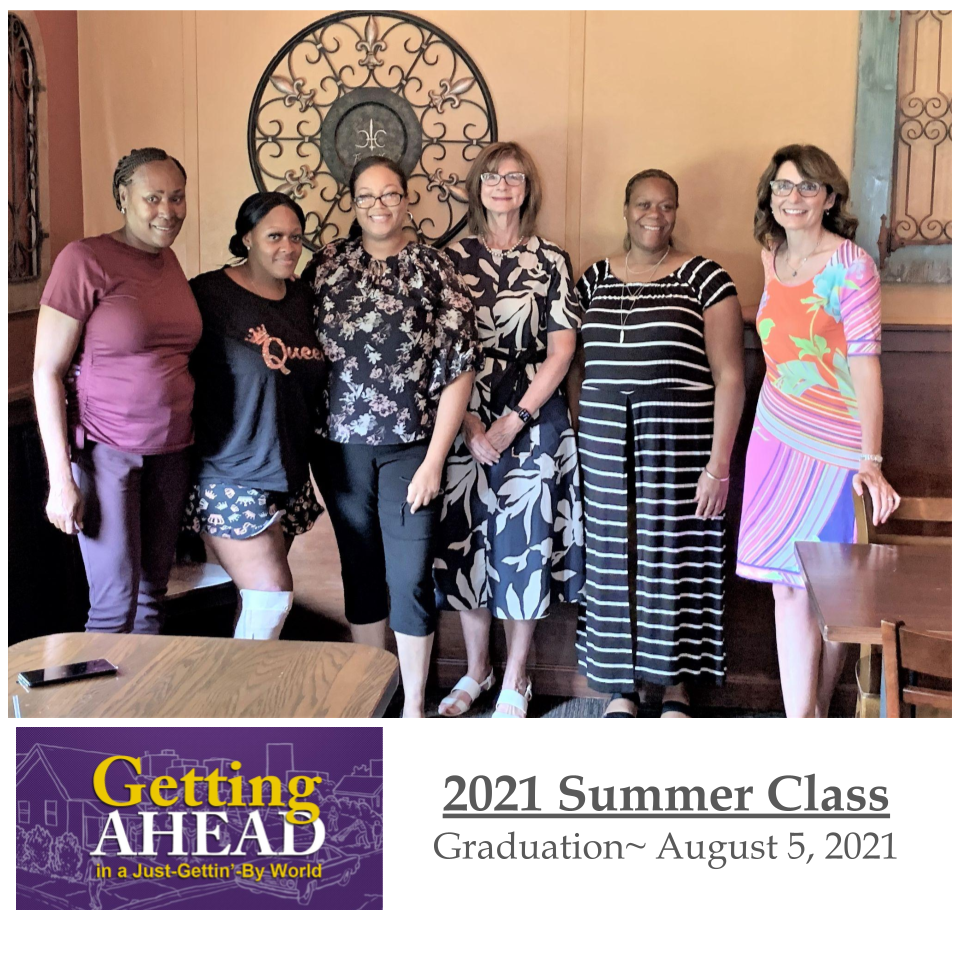 Group of six women pose for graduation.