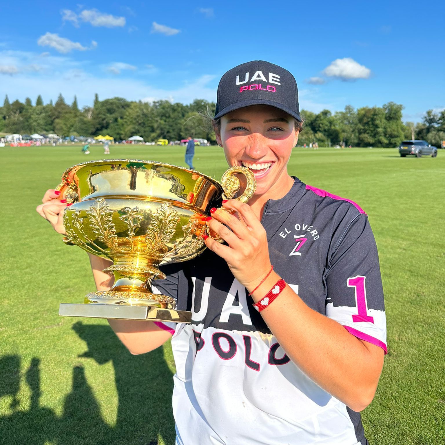 Kayley Smith Holding the Gold Cup for UAE