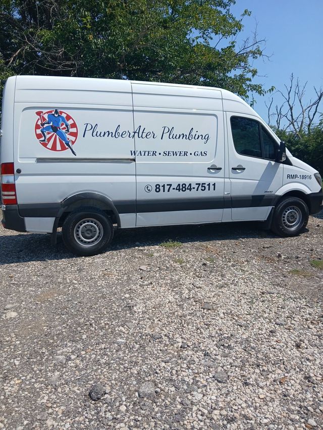 White service van parked on gravel with company logo and phone number, beside trees under a blue sky