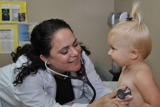 Happy Doctor with Baby