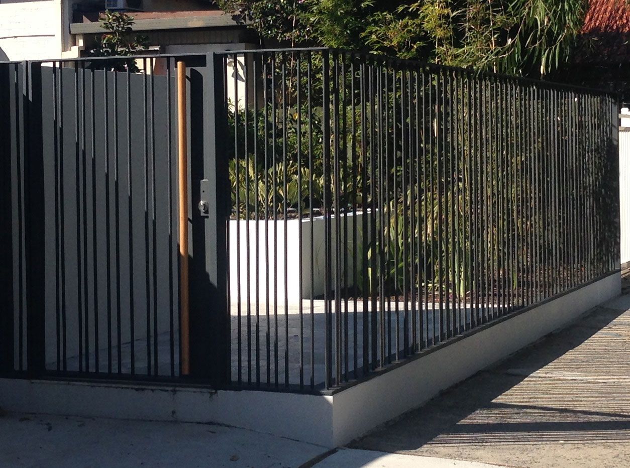steel fencing and front gate