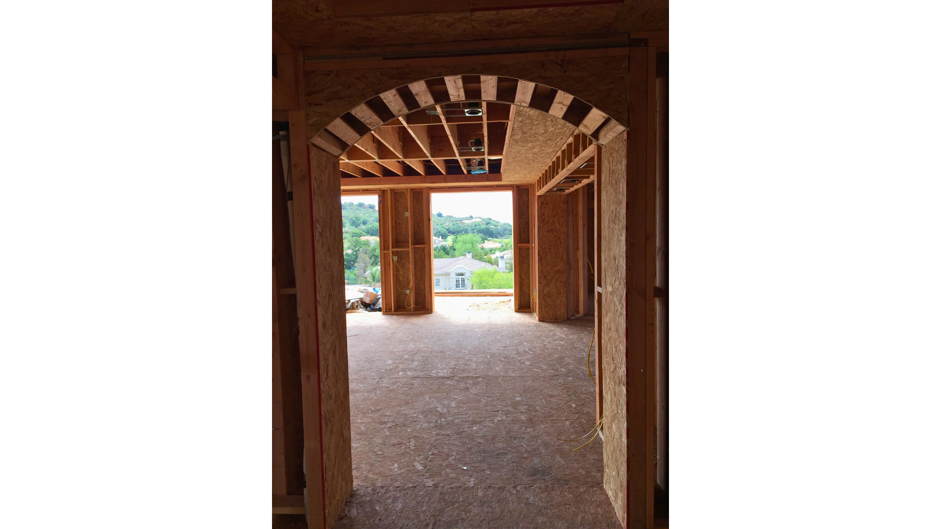 A view of a room in a house under construction.