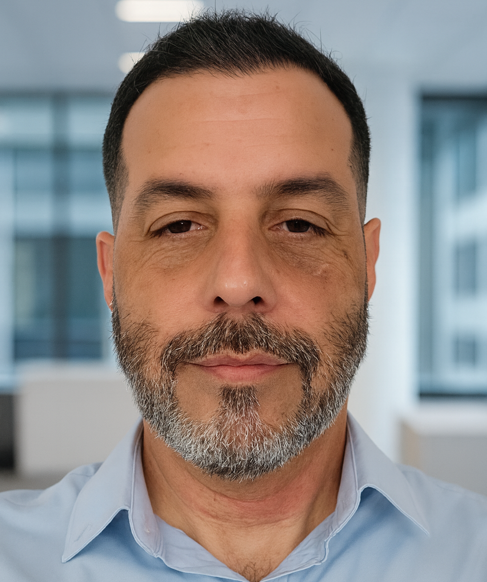 A coming soon sign with a picture of a mountain in a circle.