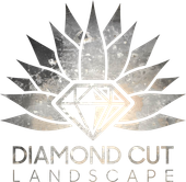 A logo for diamond cut landscape with a diamond in the center