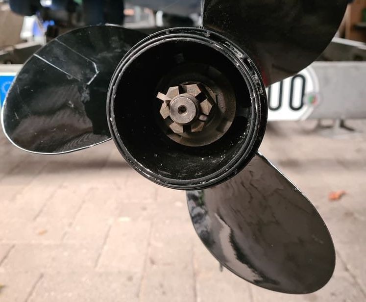 A close up of a propeller on a boat