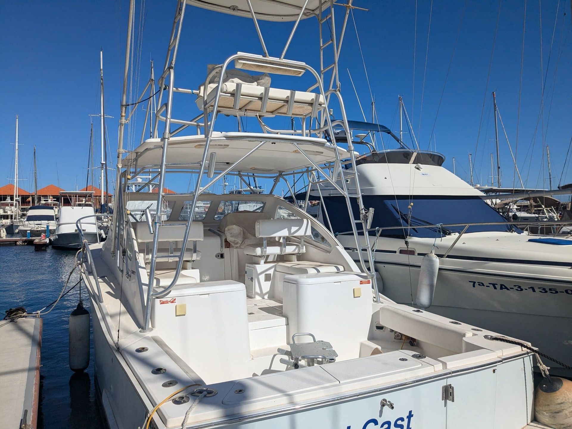 A boat is docked in a marina