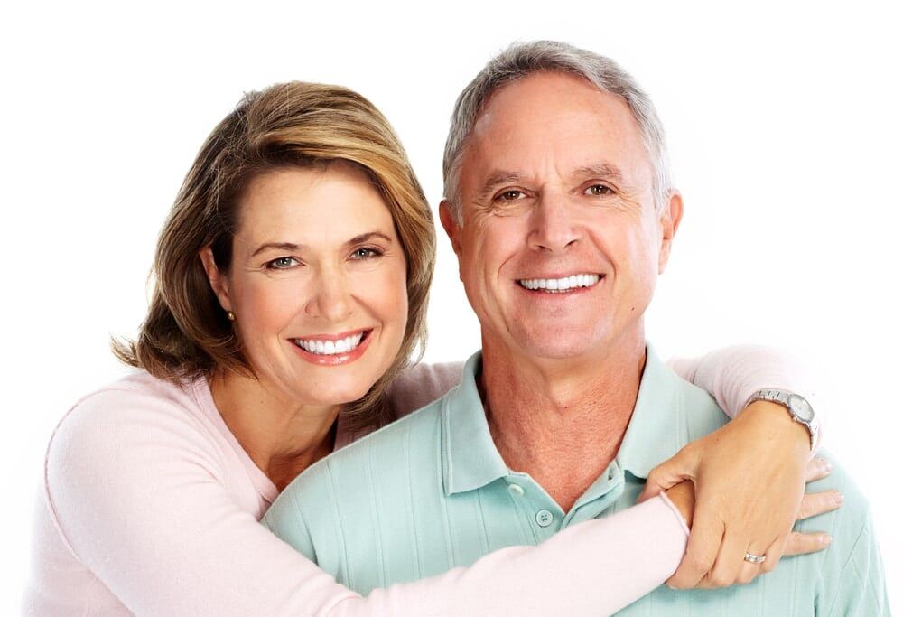 Couple Smiling — Dental Services In Mackay & Sarina, QLD