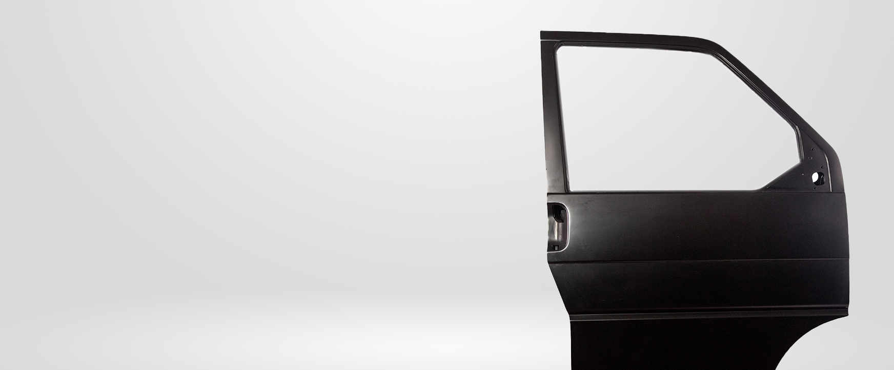 Black car door against a white background.