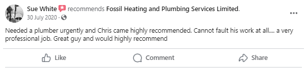 A blurred image of a facebook post about a plumber