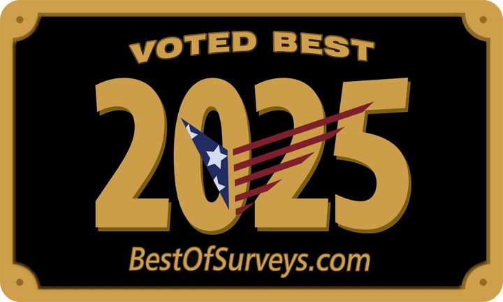 Gold framed sign: Sirois Electric voted best electrical contractor in Burlington 2024, BestOfSurveys.com.
