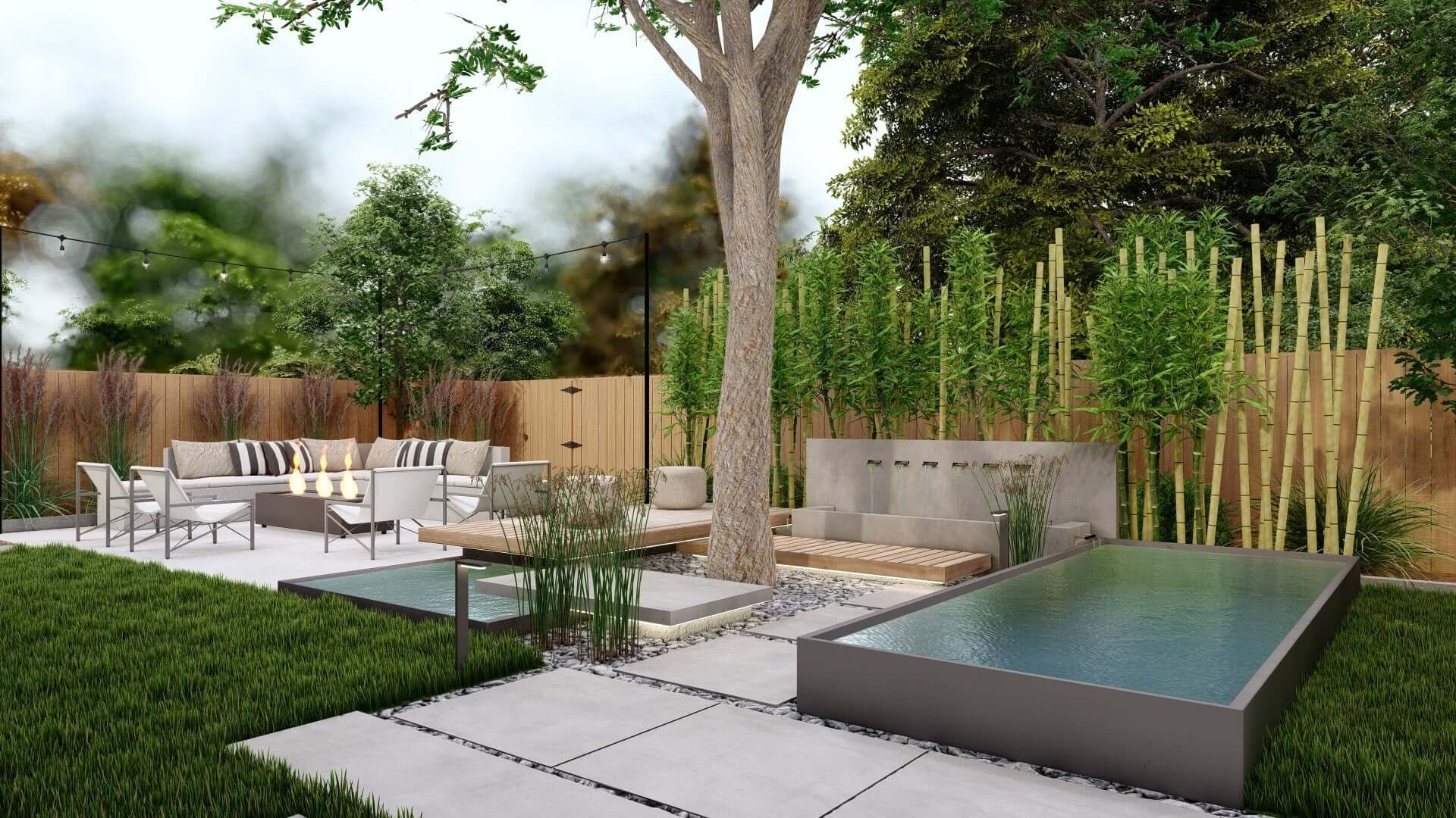 Modern backyard with water features, seating, a fire pit, and bamboo, under a cloudy sky.