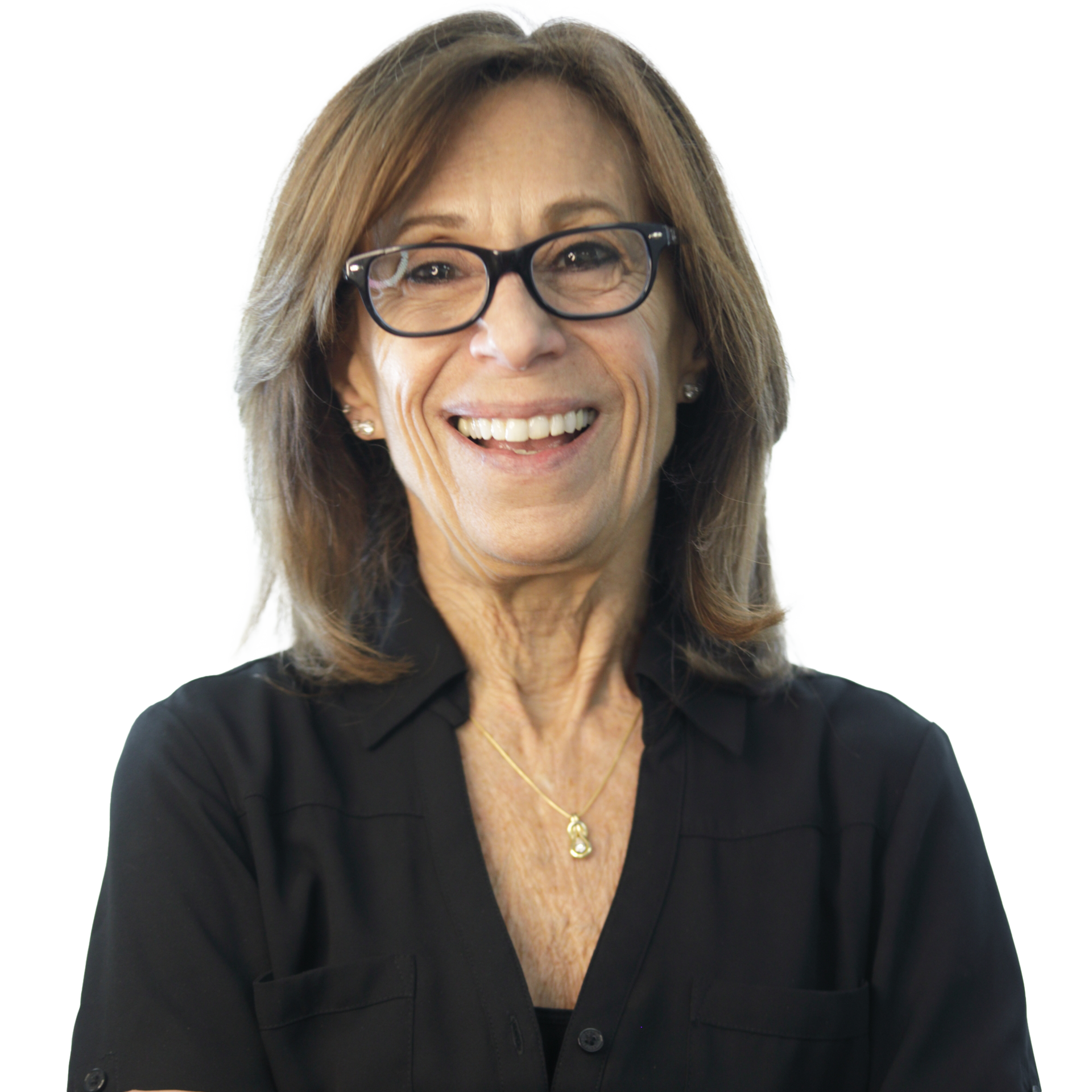Woman with glasses, smiling, wearing a black shirt, and a gold necklace.