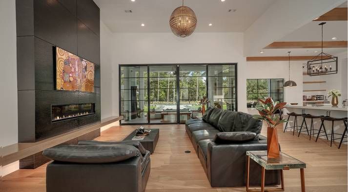 A living room filled with furniture and a flat screen tv.