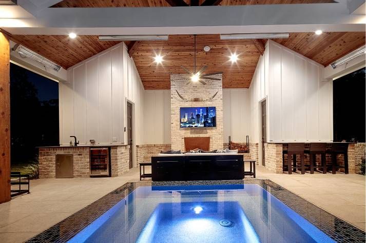 There is a large swimming pool in the middle of the room.