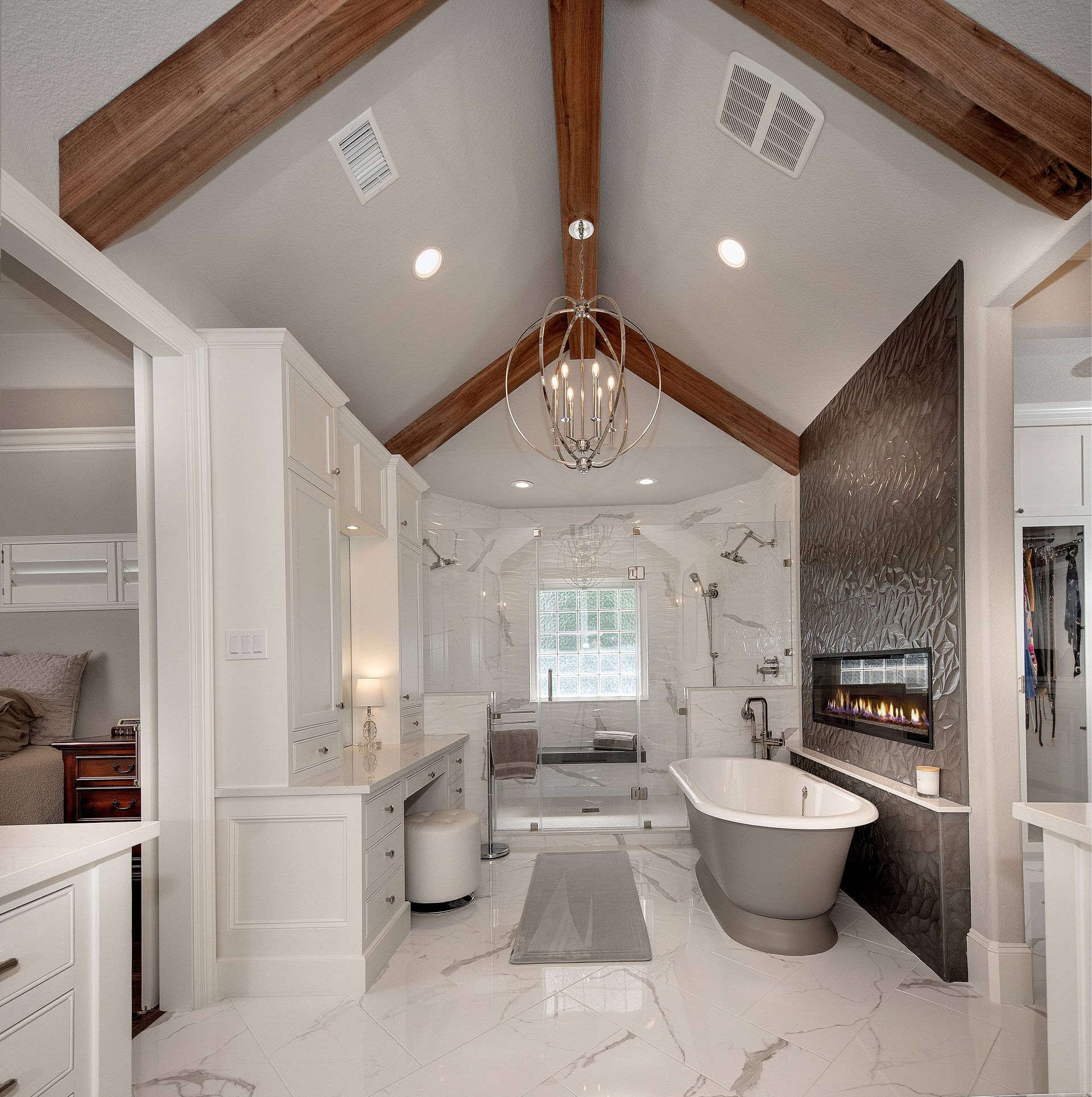A bathroom with a bathtub and a fireplace