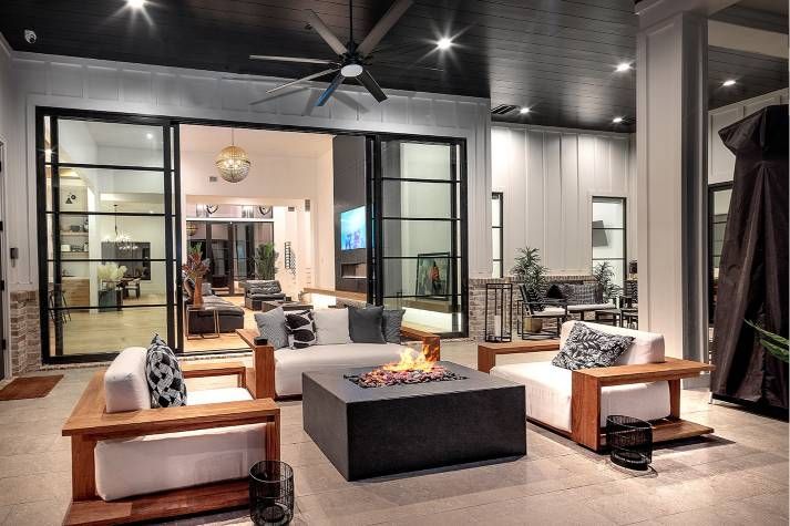 There is a fire pit in the middle of the living room.