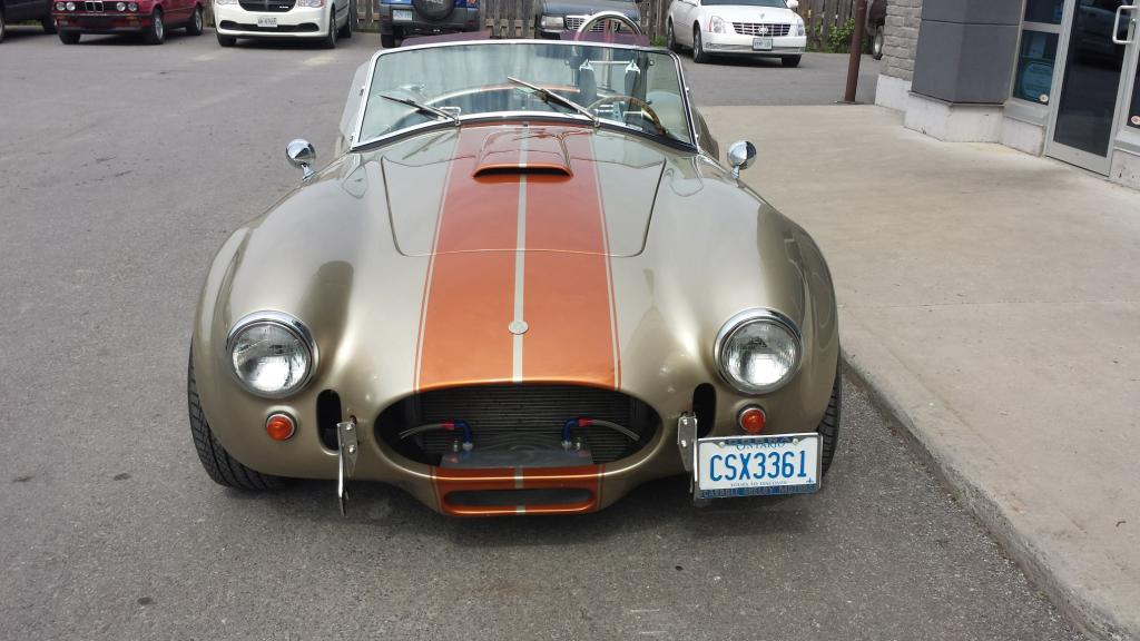 A car with a license plate that says csx3163