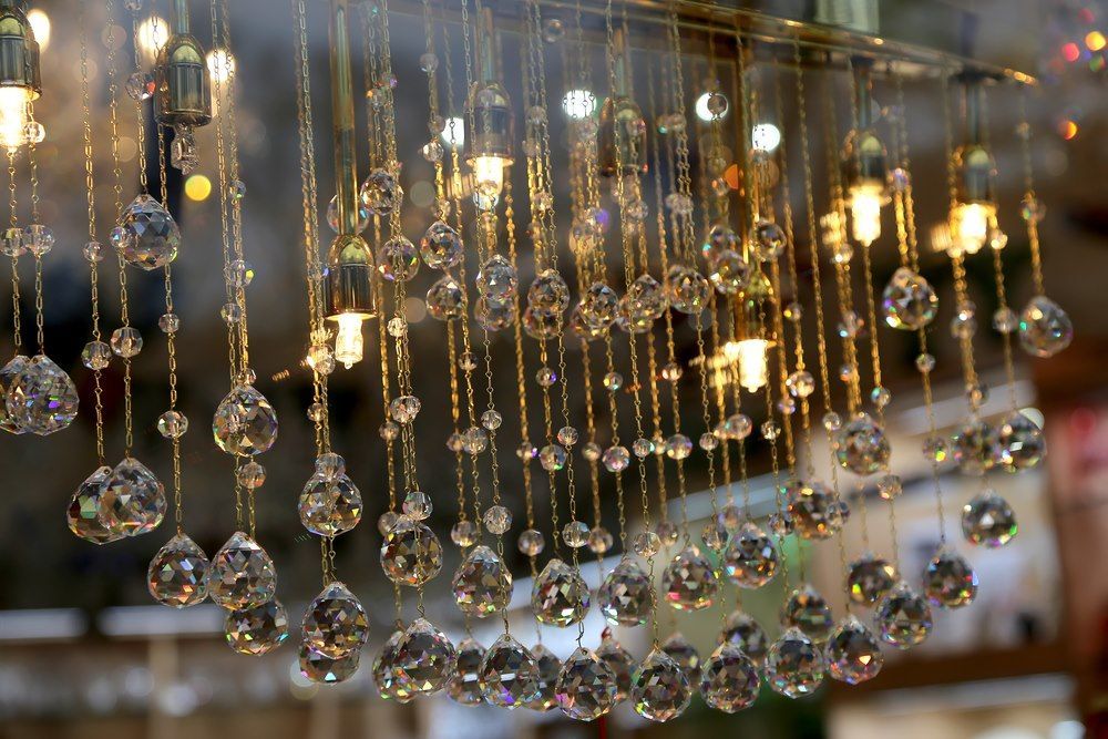 Crystal Chandelier With Dangling Teardrop-shaped Prisms — Atack Electrical in Brown Hill, VIC