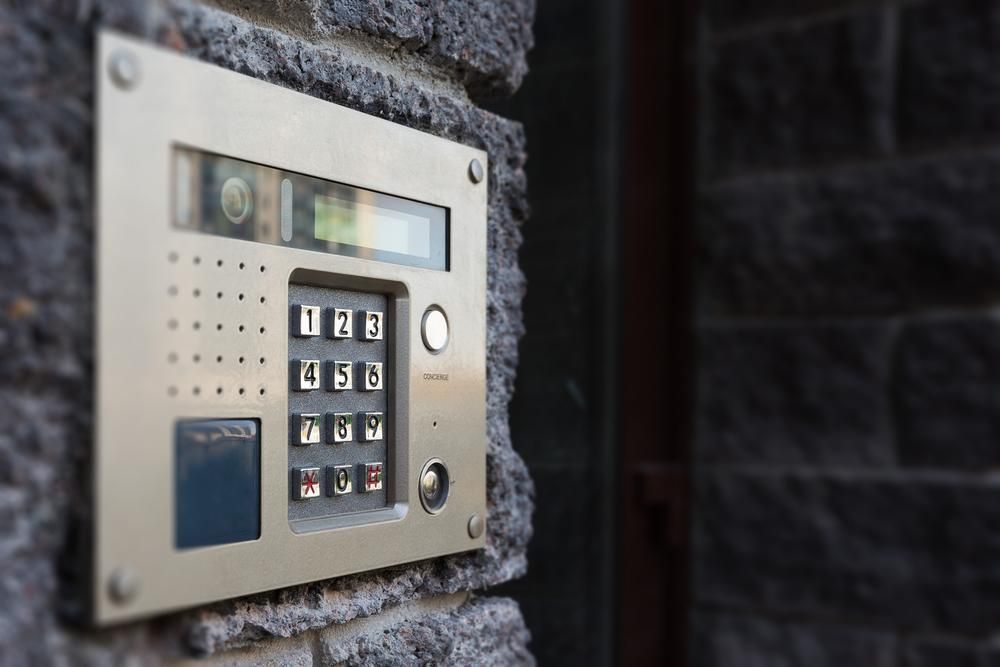 A Close up Of a Keypad on A Brick Wall — MNC Security in Sapphire Beach, NSW