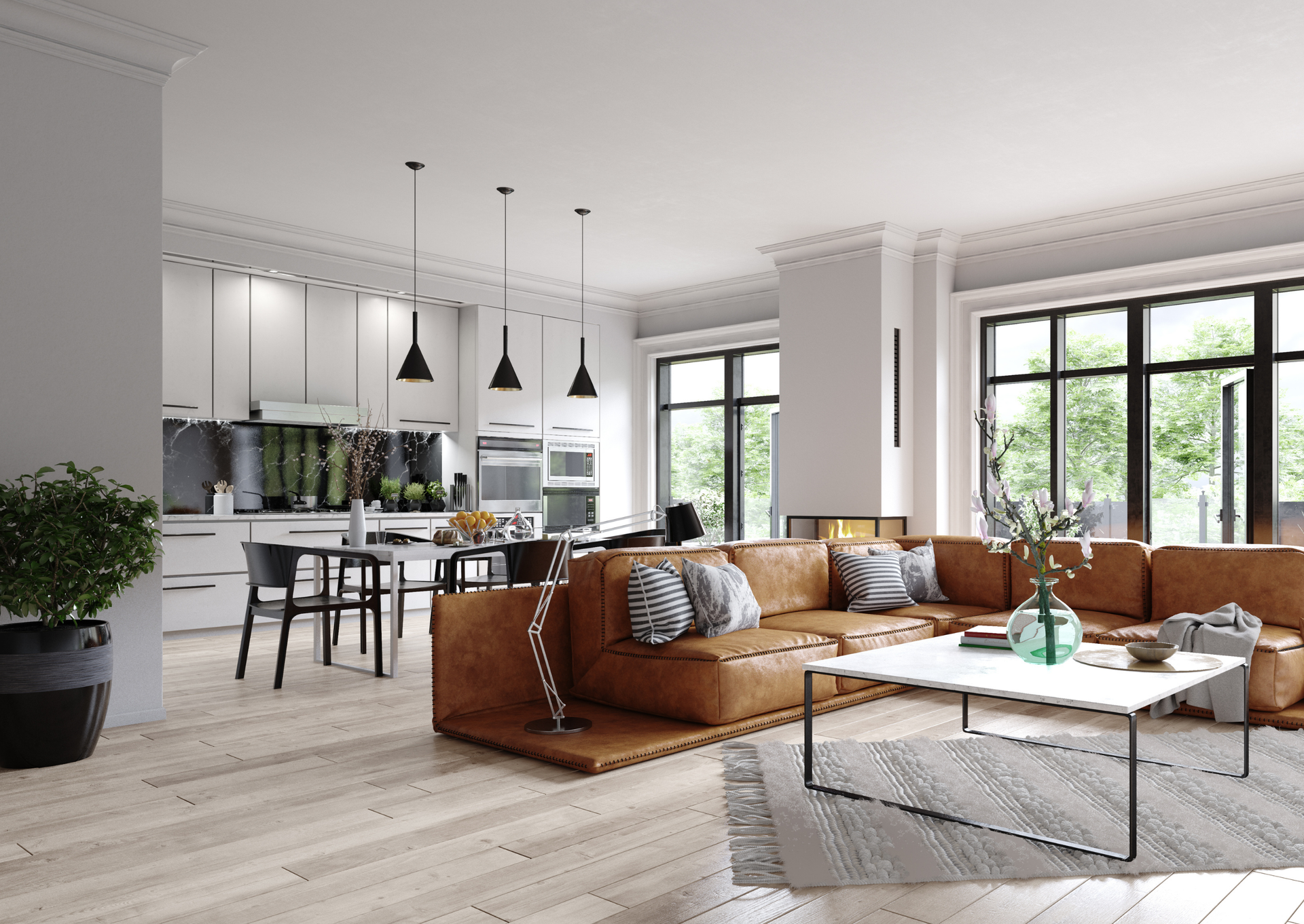 Spacious modern living area with kitchen, brown sectional, coffee table, and large windows.