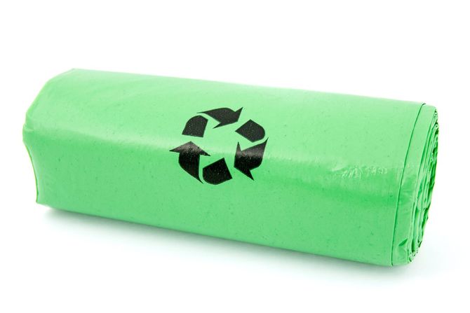 Green garbage bio bags in a roll