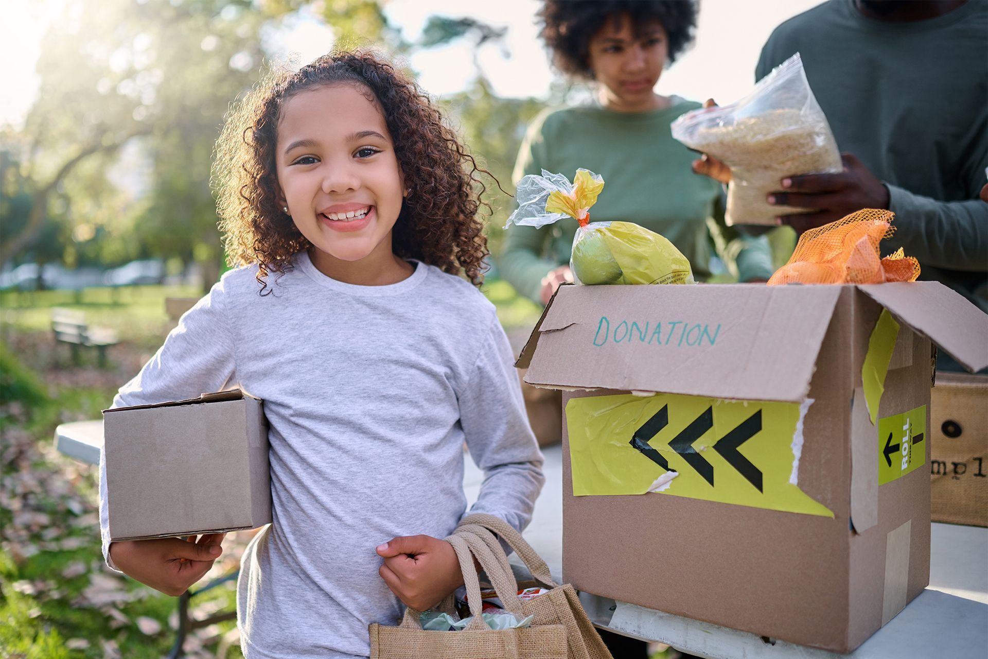 Happy Little Girl Receiving Donations