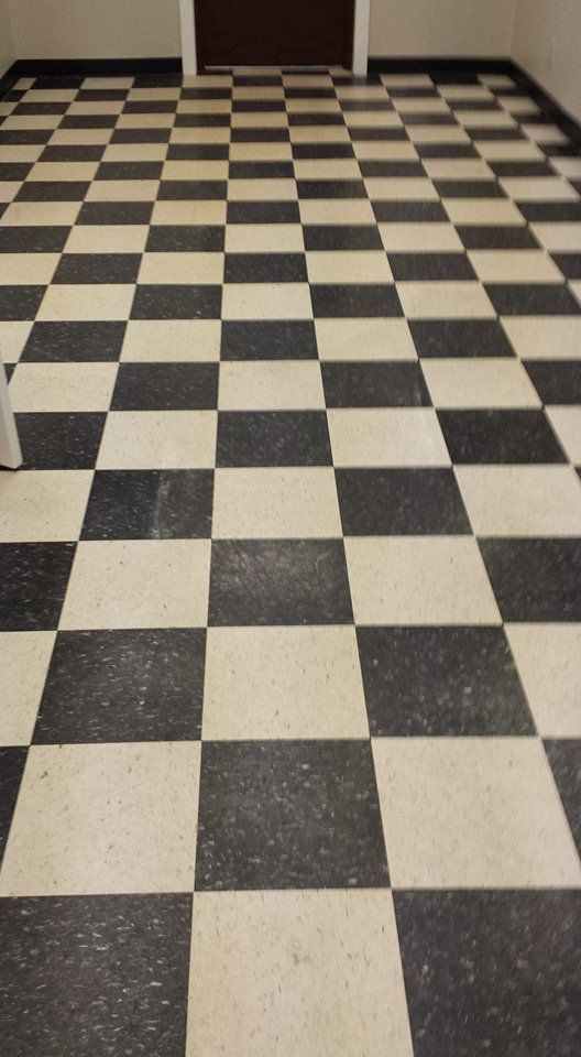 A black and white checkered floor in a room