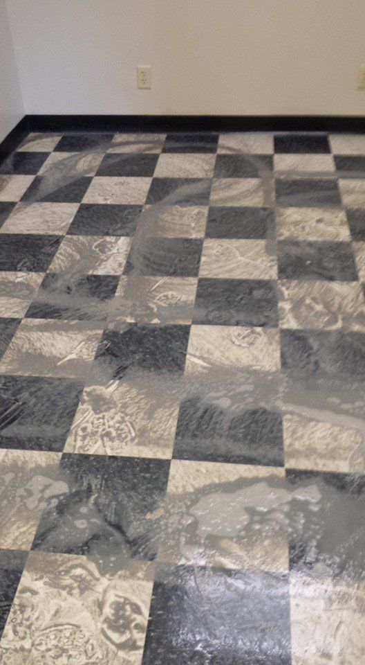 A black and white checkered floor in a room.