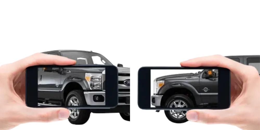 Two smartphones showing a black pickup truck from side and front views on a white background