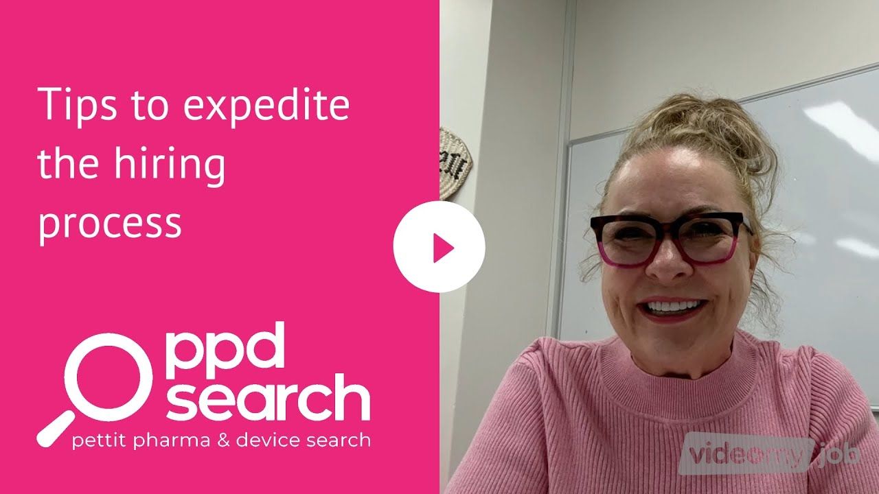 Woman in pink top and glasses smiles, next to text 