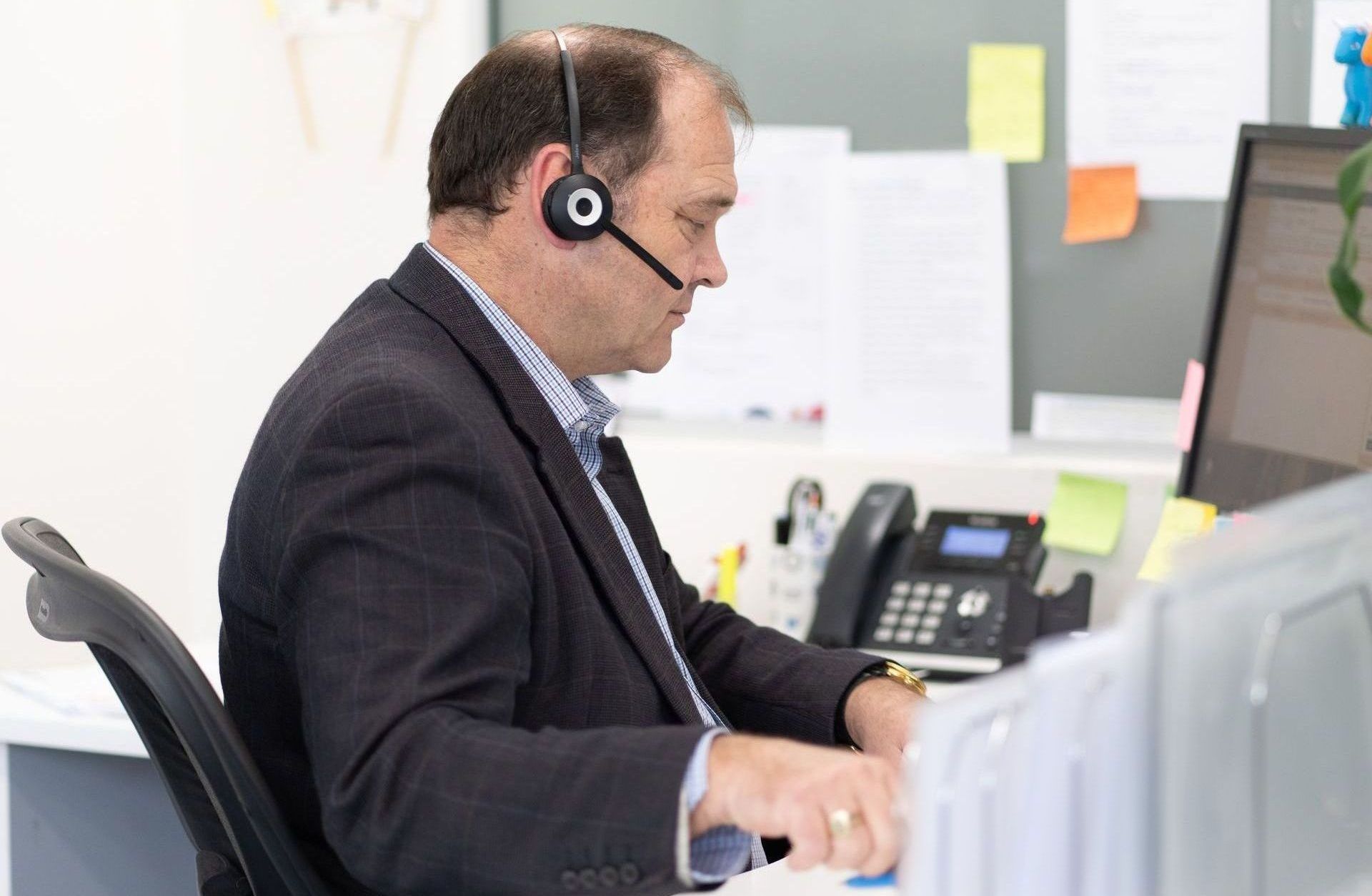 Hands connecting puzzle pieces, surrounded by network of people and data charts.