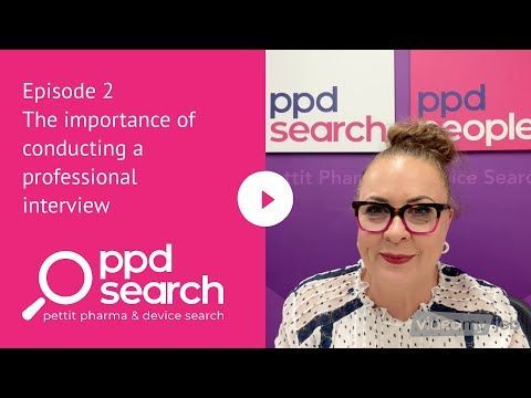 Woman with glasses, in office, discussing professional interviews. Pink and white PPD Search logo.