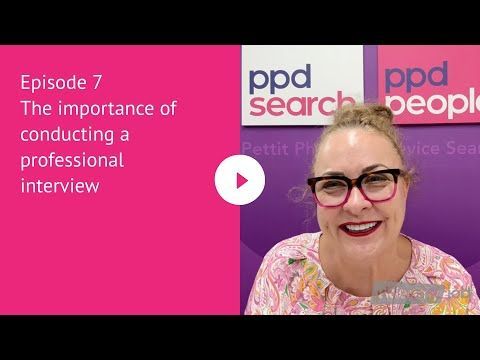 A woman with glasses, in front of a PPD sign, speaks about professional interviews.