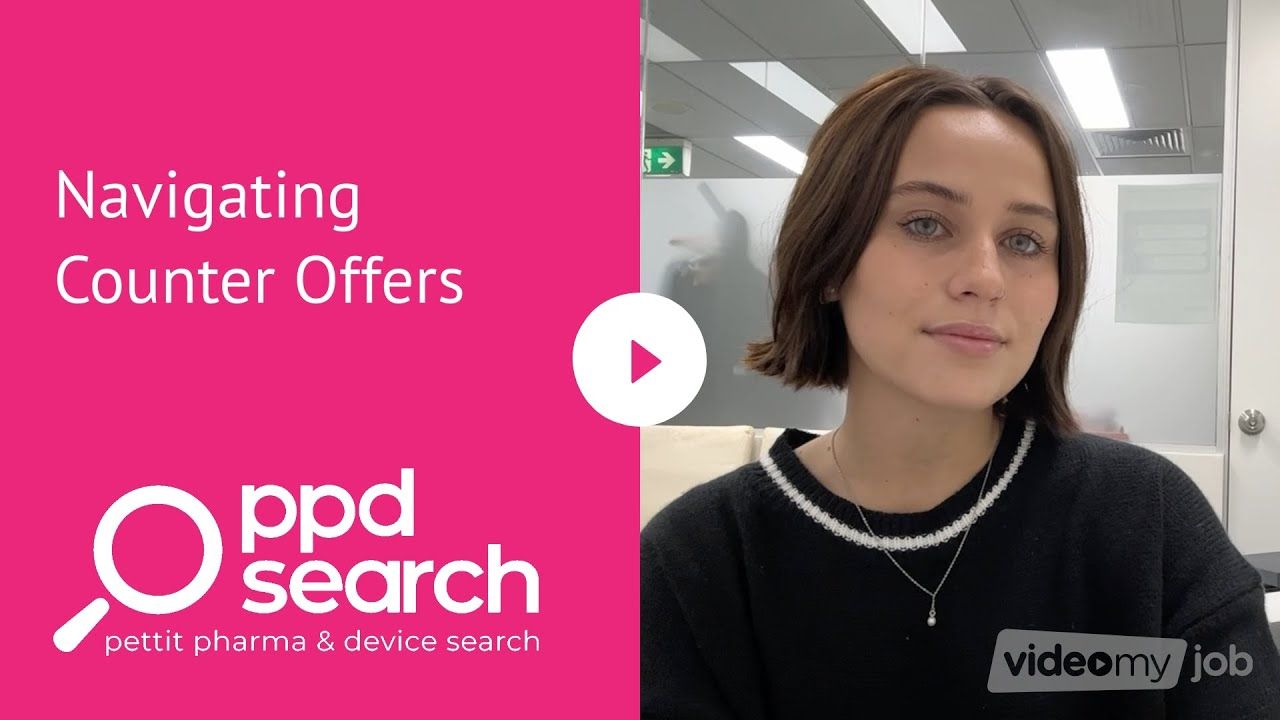 Woman in office setting discussing counter offers with 