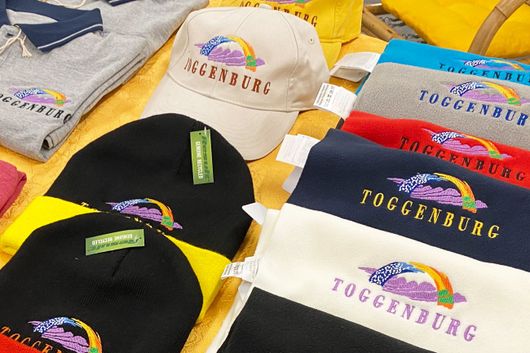 Wir besticken Ihre Textilie mit dem Toggenburg Logo