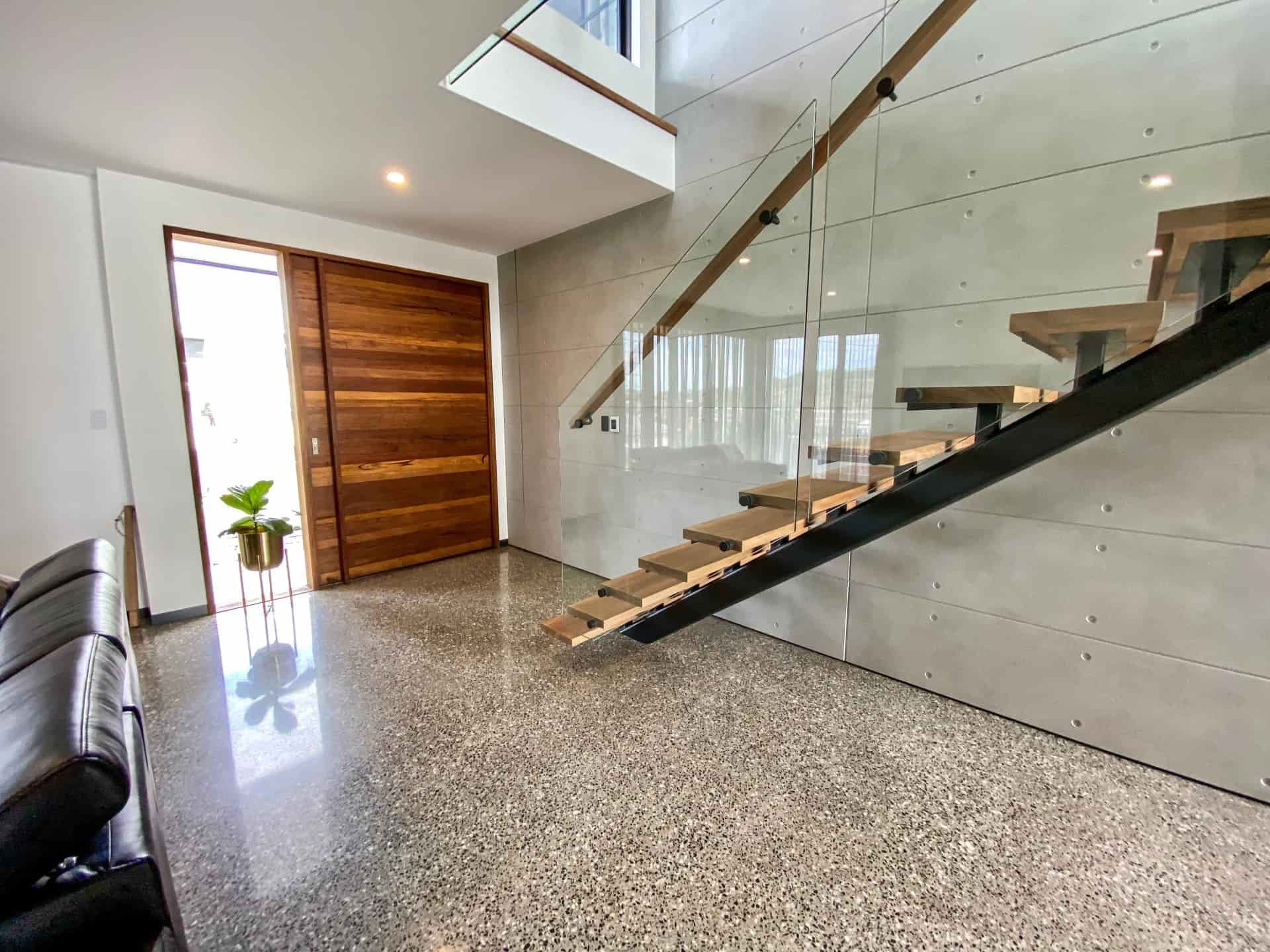 Modern Bathroom With a White Tub, Floating Sink — Envisage Construction and Design in Ulladulla, NSW