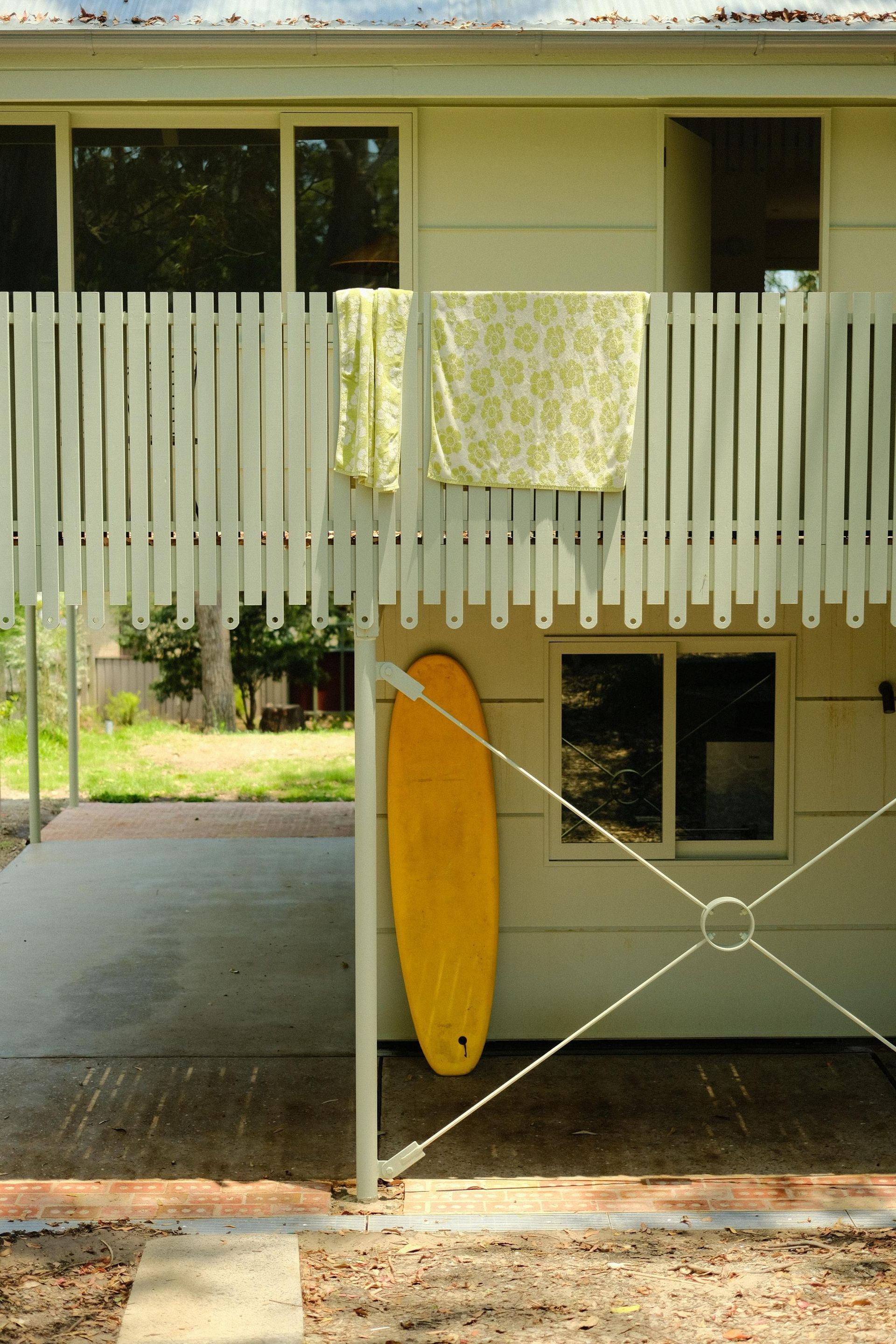 Outside of a House with Clothes Hanging — Envisage Construction and Design in Meadowbank, NSW