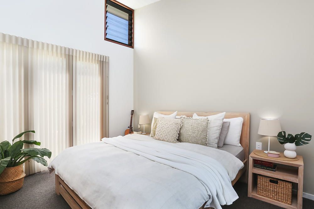 Bedroom With Light Wood Bed Frame, White Bedding — Envisage Construction and Design in Koloona Dr, NSW
