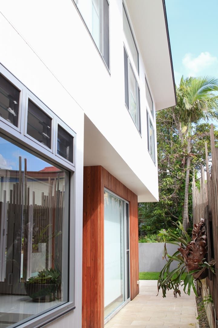 White Modern House With Large Windows — Envisage Construction and Design in Sydney, NSW