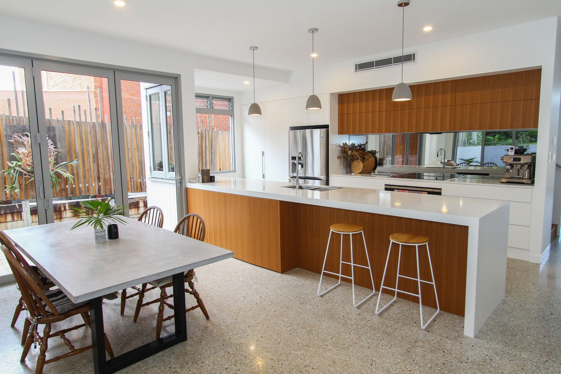 Dining Area with An Outside View — Envisage Construction and Design in Sydney, NSW