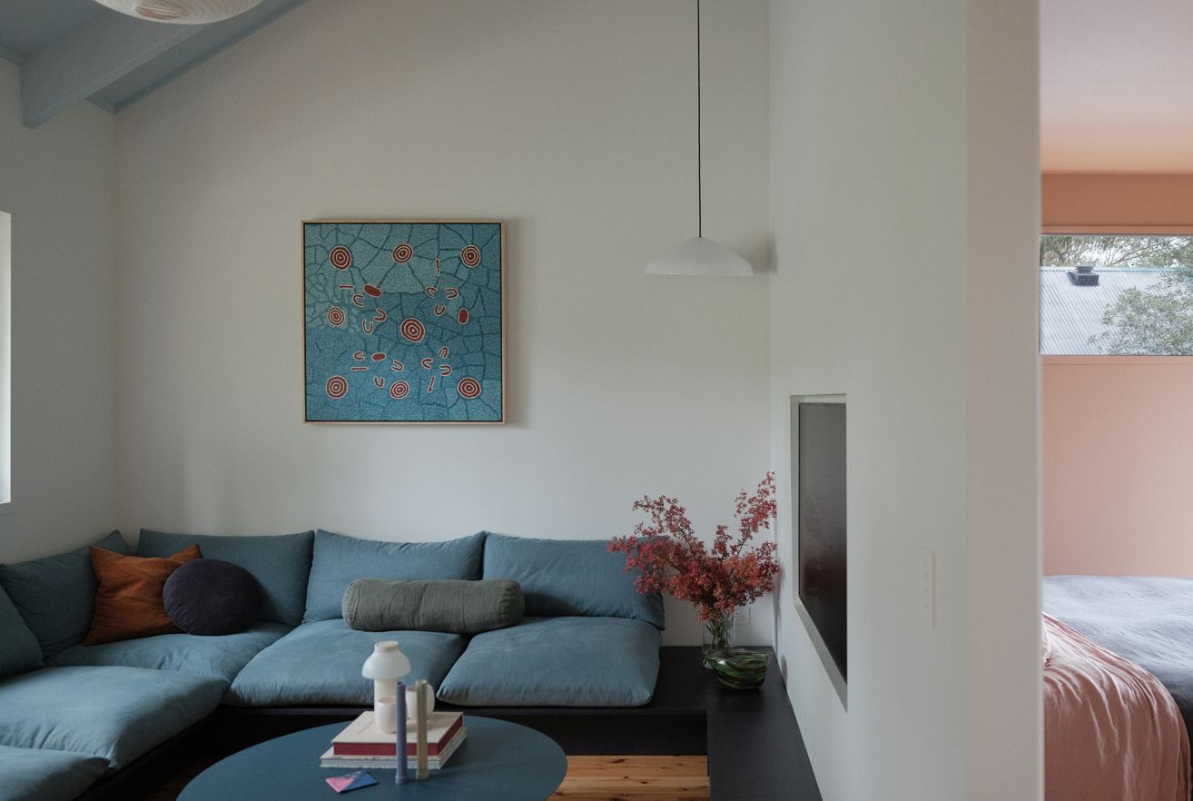 A Living Room with Sofa and Painting — Envisage Construction and Design in Meadowbank, NSW