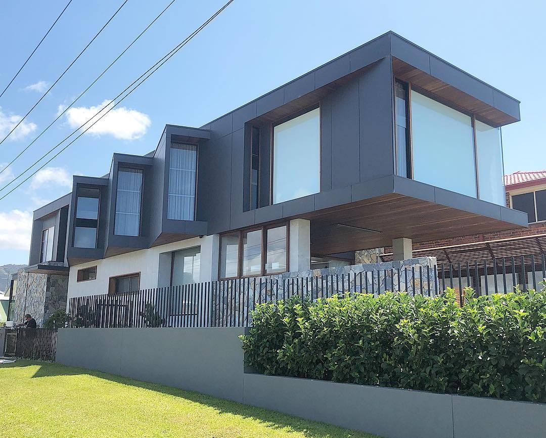Modern House With Grey and White Exterior, Large Windows, — Envisage Construction and Design in Mountain, NSW